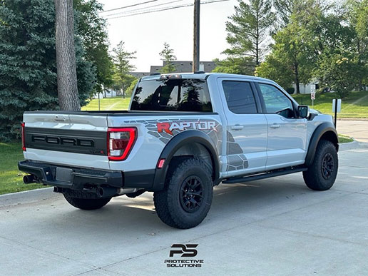 A shiny Ford Raptor truck with a new ceramic coating